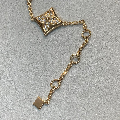[Elara]ARMBAND "STERN UND SONNE" MIT 4 MOTIVEN, GOLD UND DIAMANTEN