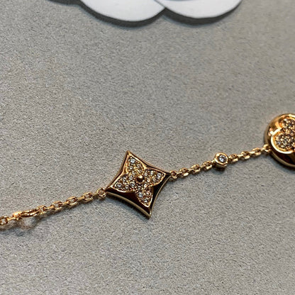 [Elara]ARMBAND "STERN UND SONNE" MIT 4 MOTIVEN, GOLD UND DIAMANTEN