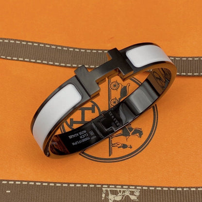 [Elara]H ARMBAND 12MM SCHWARZ WEISS KERAMIK