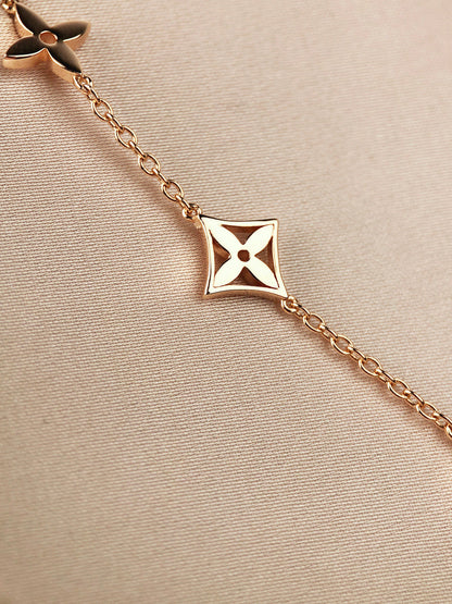 [Elara]ARMBAND "STAR AND SUN 7 MOTIFS" AUS GOLD