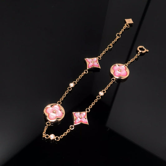 [Elara]STAR AND SUN 4 MOTIF PINK MOP ROSE GOLD BRACELET