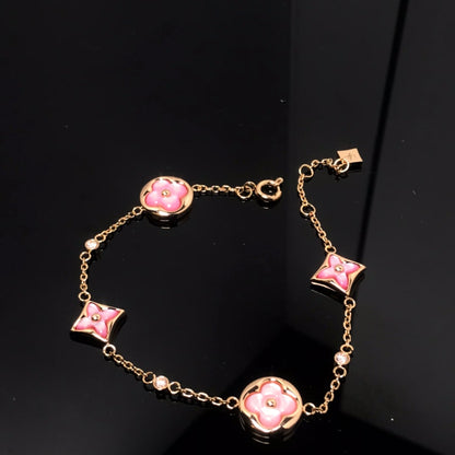 [Elara]STAR AND SUN 4 MOTIV ROSA PERLMUTT ROSÉGOLD-ARMBAND