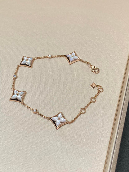 [Elara]STAR 4 MOTIV PERLMUTT DIAMANT ROSÉGOLD ARMREIF