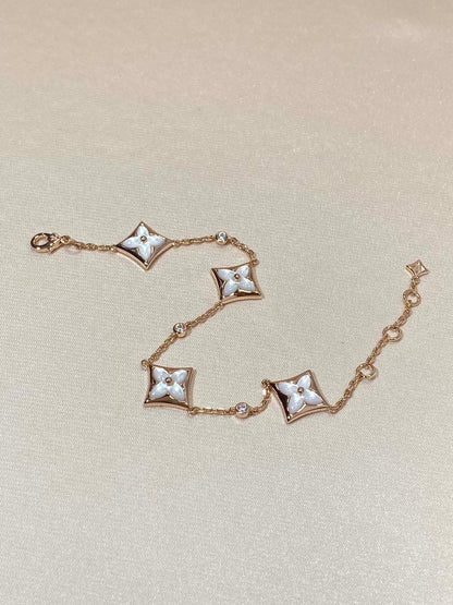 [Elara]STAR 4 MOTIV PERLMUTT DIAMANT ROSÉGOLD ARMREIF