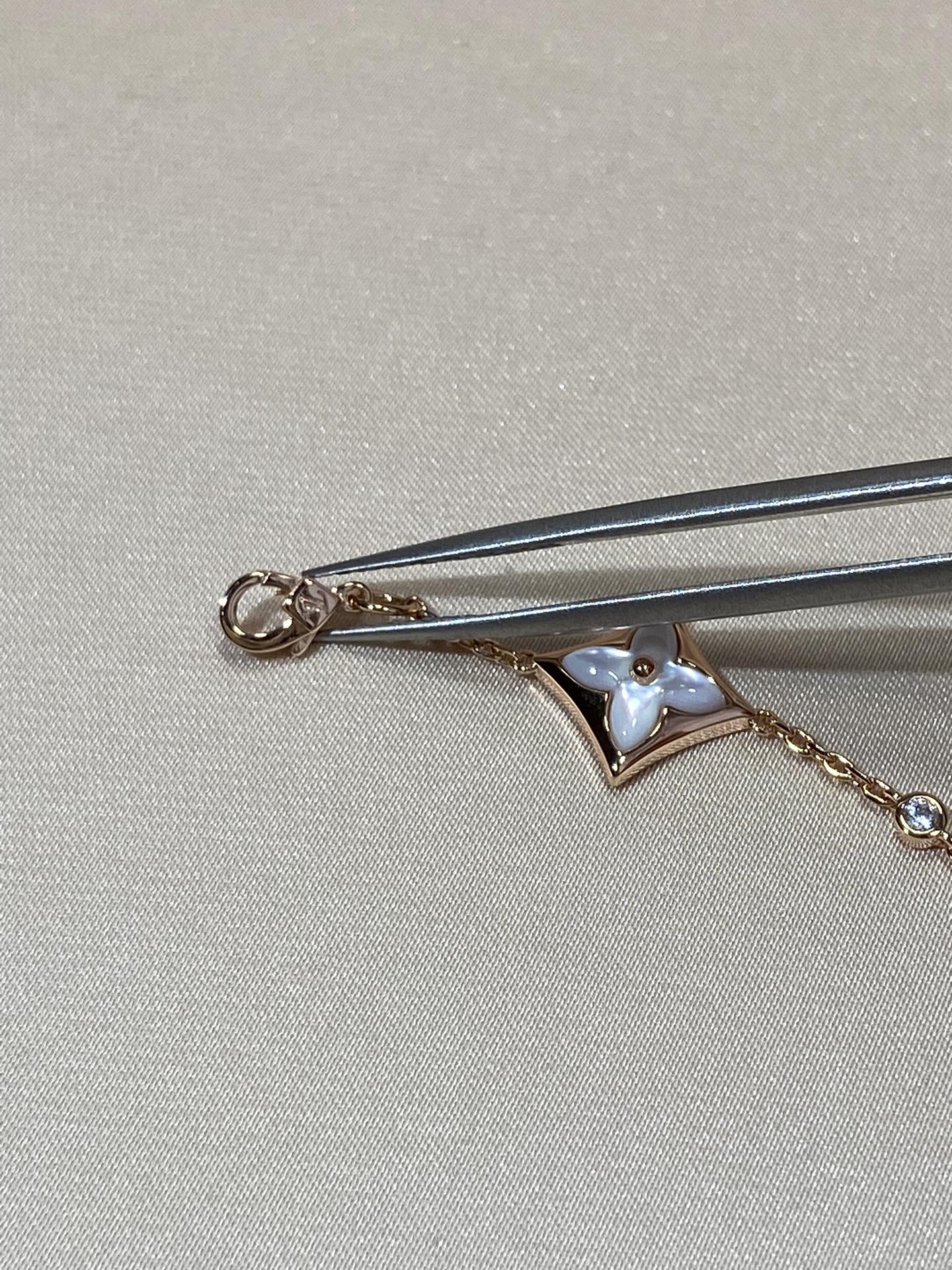 [Elara]STAR 4 MOTIV PERLMUTT DIAMANT ROSÉGOLD ARMREIF
