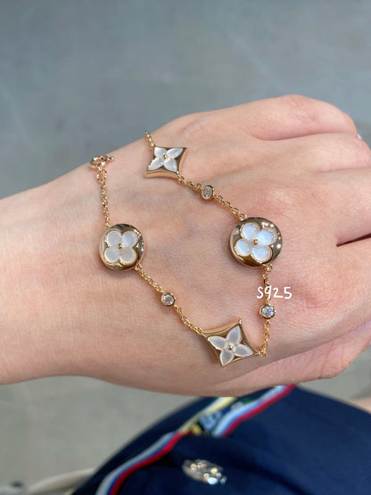 [Elara]STAR AND SUN 4 MOTIV WEISS MOP ROSÉGOLD ARMREIF