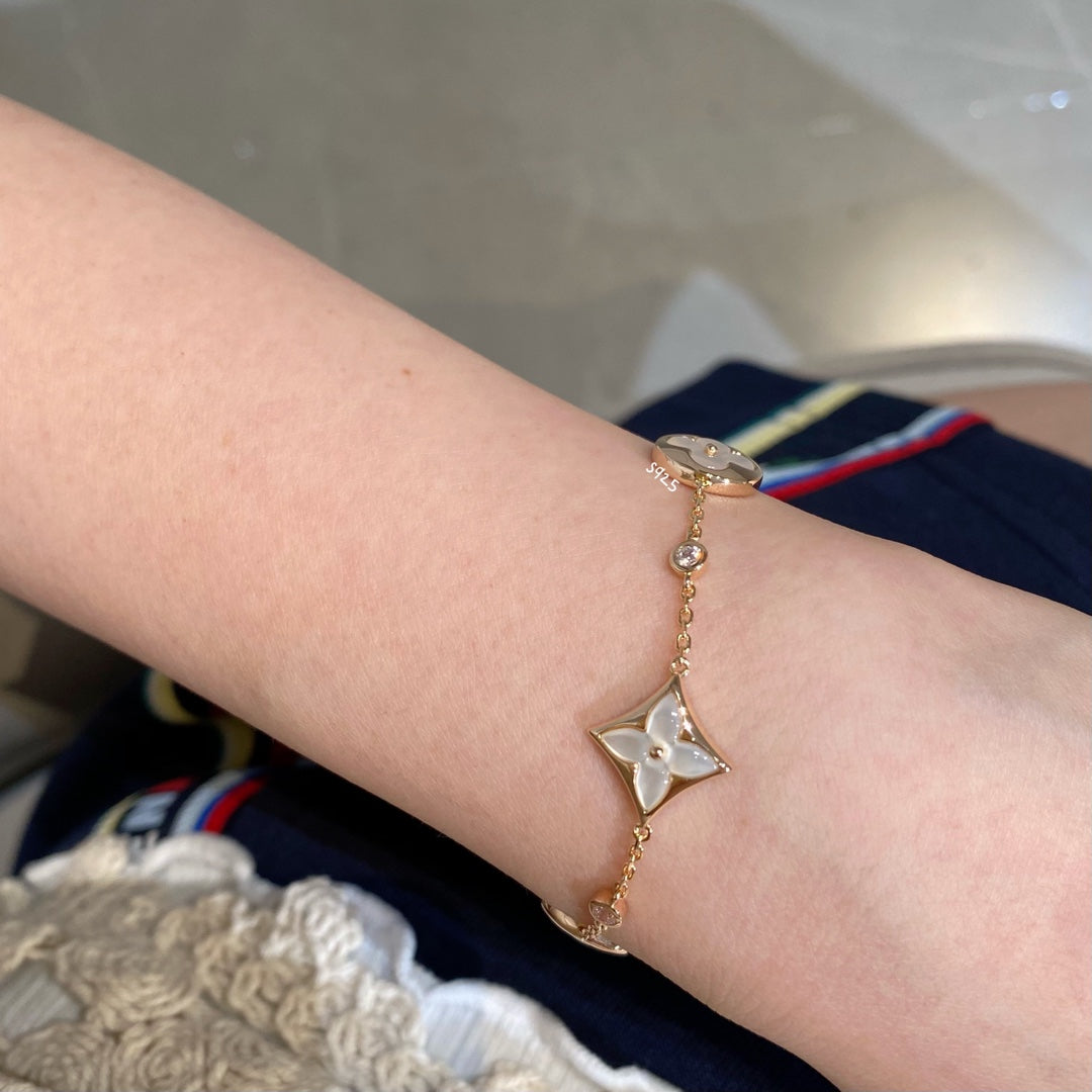 [Elara]STAR AND SUN 4 MOTIV WEISS MOP ROSÉGOLD ARMREIF