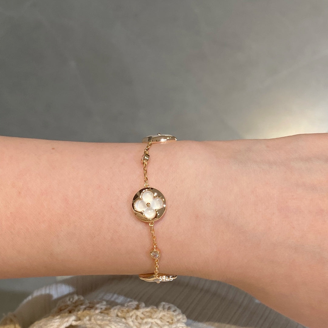 [Elara]STAR AND SUN 4 MOTIV WEISS MOP ROSÉGOLD ARMREIF