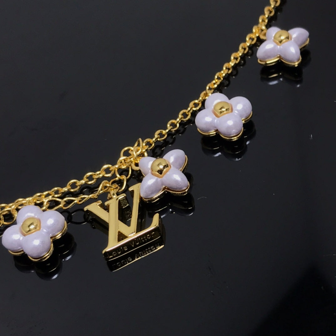 [Elara]LOGO 6 MOTIF STAR AND SUN GOLD BRACELET
