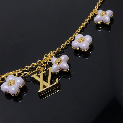 [Elara]LOGO 6 MOTIF STAR AND SUN GOLD BRACELET