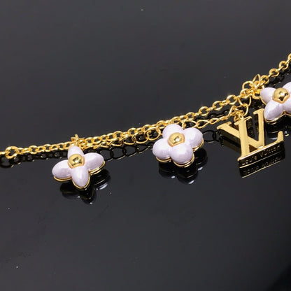 [Elara]LOGO 6 MOTIF STAR AND SUN GOLD BRACELET