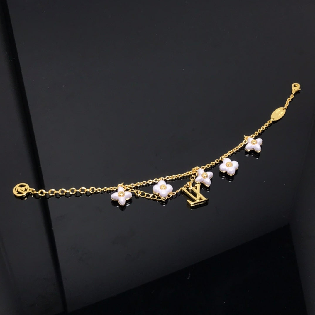 [Elara]LOGO 6 MOTIF STAR AND SUN GOLD BRACELET