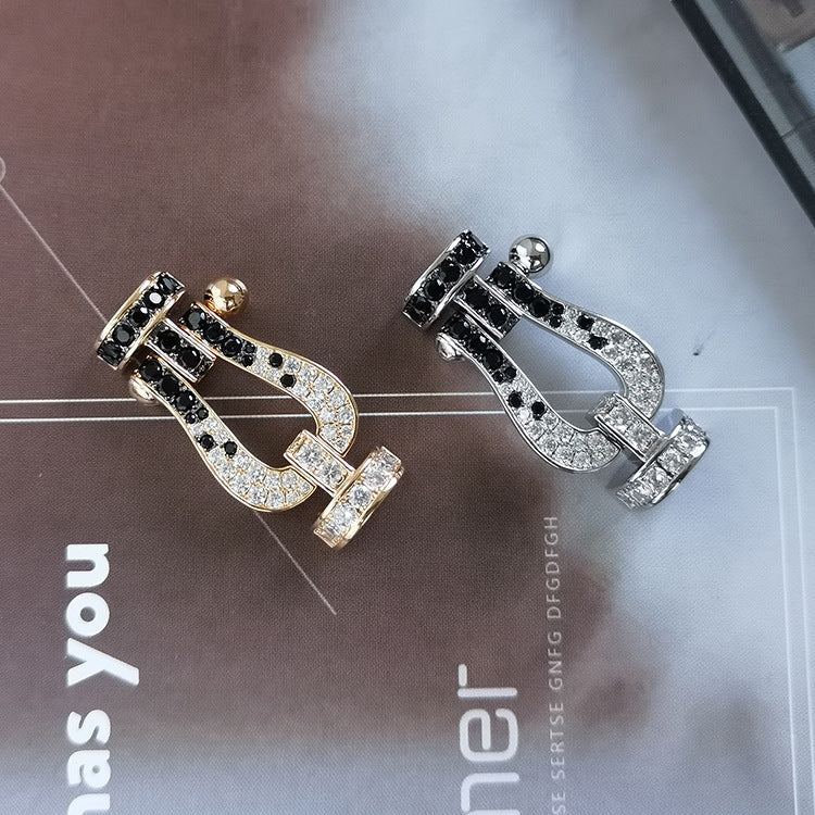 [Elara]GROSSES HUFEISEN ARMBAND AUS SCHWARZEN UND WEISSEN DIAMANTEN - WEISSGOLD