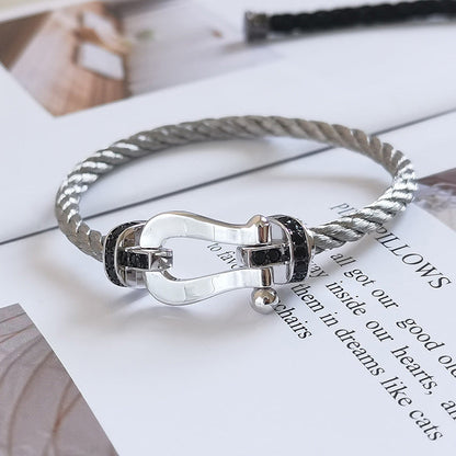 [Elara]FORCE LARGE HORSESHOE BLACK DIAMOND BRACELET - WHITE GOLD