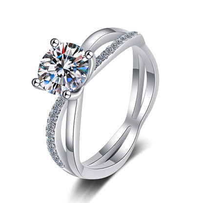 ```json
{
  "jewelryName": "[Elara]ELEGANTER 4-KRALLEN-ÜBERKREUZTER MOISSANIT-VERLOBUNGSRING"
}
```