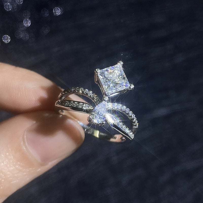 [Elara]ELEGANT DOUBLE-TWISTED MOISSANITE RING