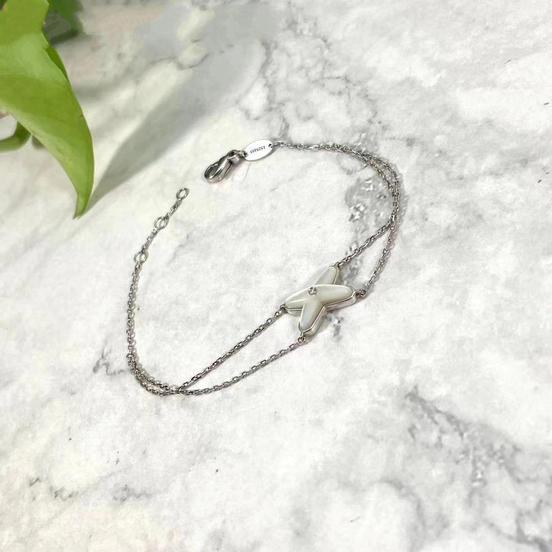 [Elara]JEUX ARMBAND WEISS PERLMUTT SILBER 1 DIAMANT