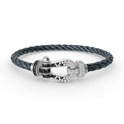 [Elara]GROSSES HUFEISEN ARMBAND AUS SCHWARZEN UND WEISSEN DIAMANTEN - WEISSGOLD