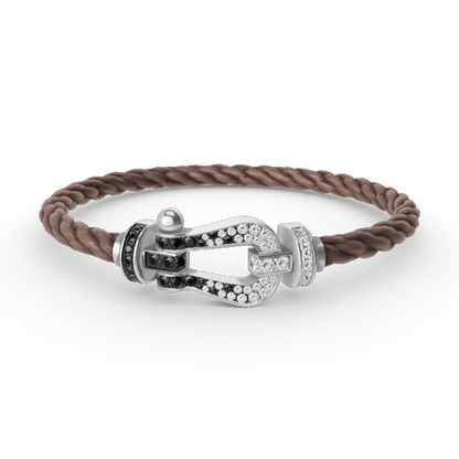 [Elara]GROSSES HUFEISEN ARMBAND AUS SCHWARZEN UND WEISSEN DIAMANTEN - WEISSGOLD