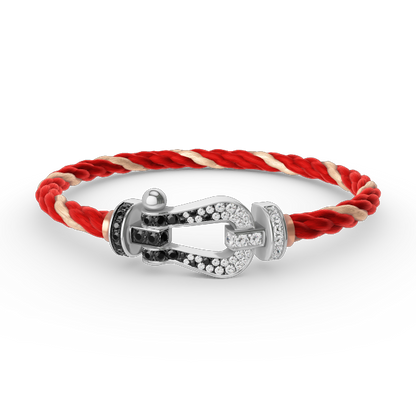 [Elara]GROSSES HUFEISEN ARMBAND AUS SCHWARZEN UND WEISSEN DIAMANTEN - WEISSGOLD