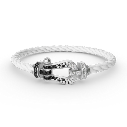 [Elara]GROSSES HUFEISEN ARMBAND AUS SCHWARZEN UND WEISSEN DIAMANTEN - WEISSGOLD